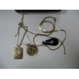 A 9ct Gold Locket Pendant on a chain; together with an ace of hearts playing card pendant, and a