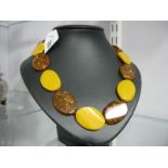 A Modern Amber Coloured Two Tone Necklace, to screw clasp.