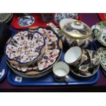 An Early XIX Century Miles Mason Teapot, matching cups and saucers; a collection of Imari plates