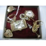 A 9ct Gold Ring, star set, together with a pair of drop earrings claw set, a Vertex wristwatch
