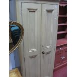 A XIX Century Pine Two Door Cupboard, adapted to a wardrobe, 74cm wide.