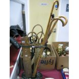 A XIX Century Style Cast Iron Stick Stand, together with a walking stick, cricket bat, carpet