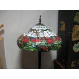 A Late XX Century Tiffany Style Standard Lamp, coloured glass shade decorated with dragonflies,