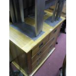 A Lightwood Chest, of two short and three long drawers having campaign handles, 84cm wide.