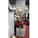 A Heavy Brass Standard lamp, with faceted lustre drops to six branches, on circular base, and