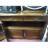 An Edwardian Mahogany Sideboard, two frieze drawers over open shelf and twin cupboard doors.