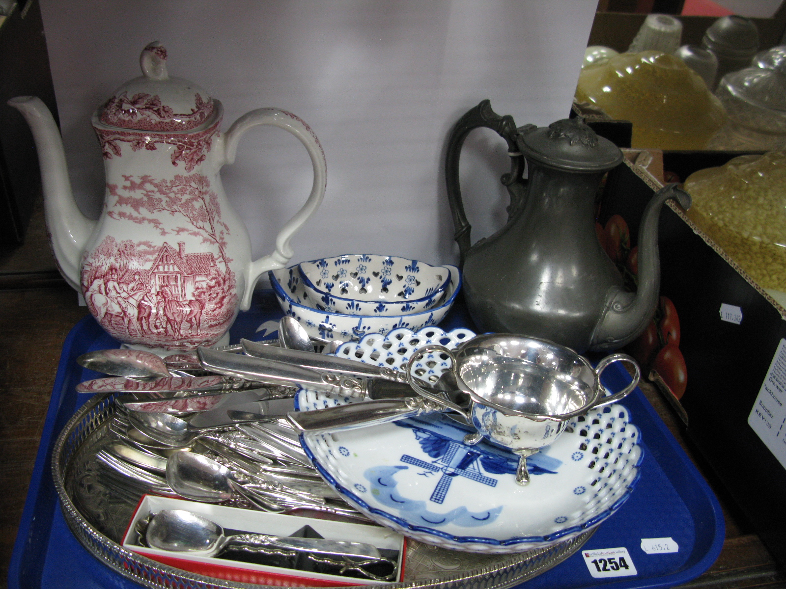 An Oval Plated Pierced and Engraved Tray, cutlery, Delf bowls, pewter teapot, etc:- One Tray