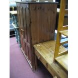 A Pine Dressing Table, with two small drawers, on turned legs; together with a pine TV cabinet, with