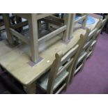 A Large Pine Kitchen Table, with single drawer on turned legs; together with eight (one carver,