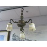 A Brass Three Scroll Branch Ceiling Light, with marbled glass shades.