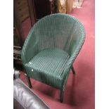 A Lloyd Loom Lusty & Sons Limited Tub Chair, in dark green.