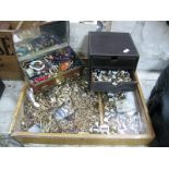 Quantity of Costume Jewellery, rings etc in display case, others in tin and three drawer chest.
