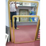 A Modern Rectangular Wall Mirror, bevelled edge, in a lightwood frame, 70 x 128cm, and a smaller