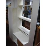 Cream Bookcase, cupboard, plus four cupboards.