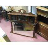 An Early XX Century Mahogany Overmantel, with shaped and pierced pediment, tapering supports,