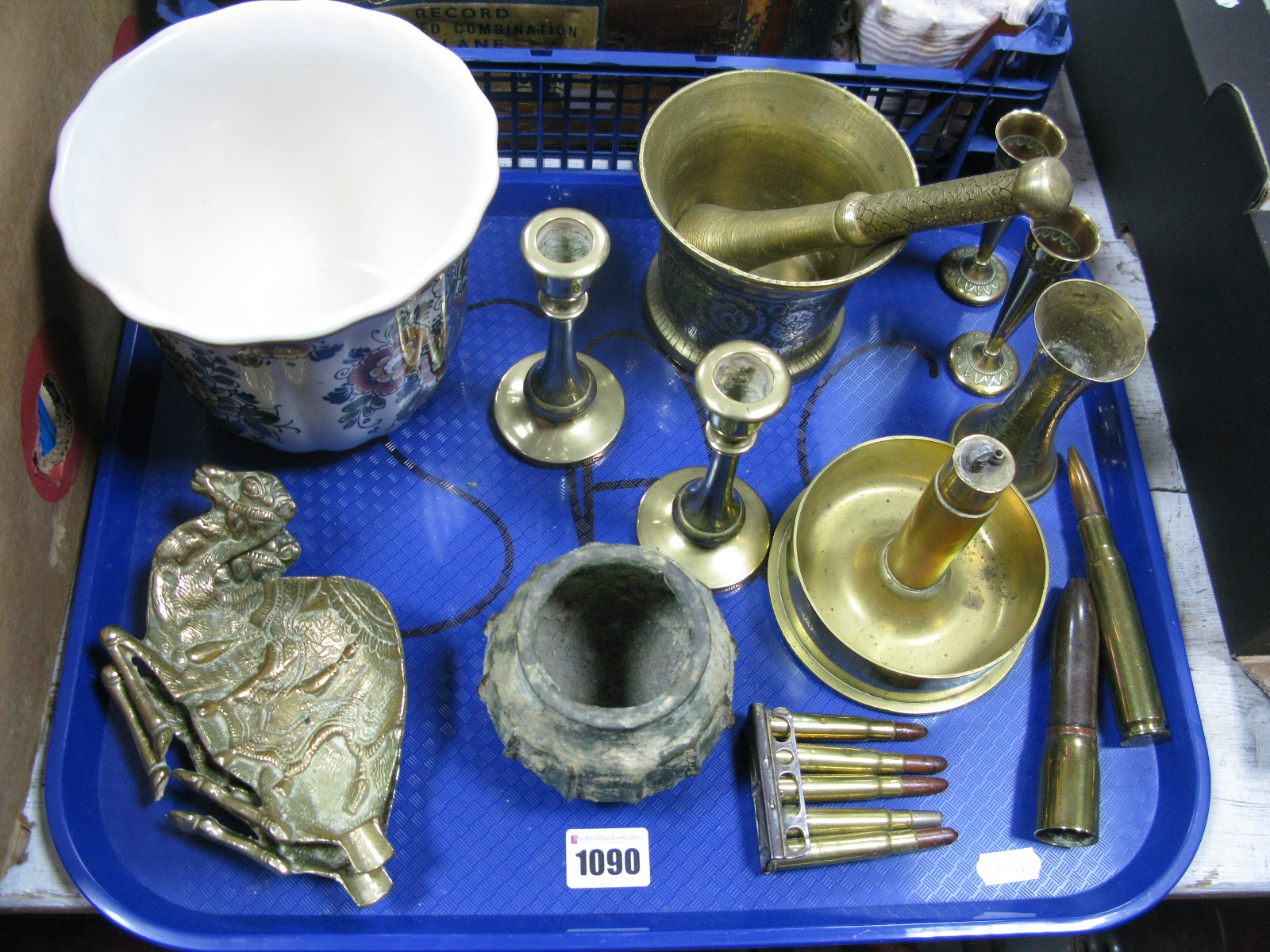 A Brass Pestle and Mortar, cartridges, brass lighter made out of a WW1 shell:- One Tray