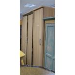 A Pair of Modern Light Wood Effect Wardrobes.