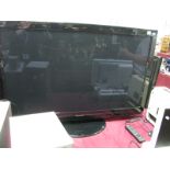 A Panasonic Viera 46" Flatscreen Colour T.V, with remote control and manuals.