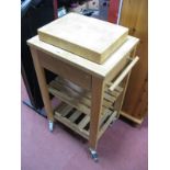 A Modern Pine Mobile Kitchen Workstation, single drawer over undertier and wine rack, with a