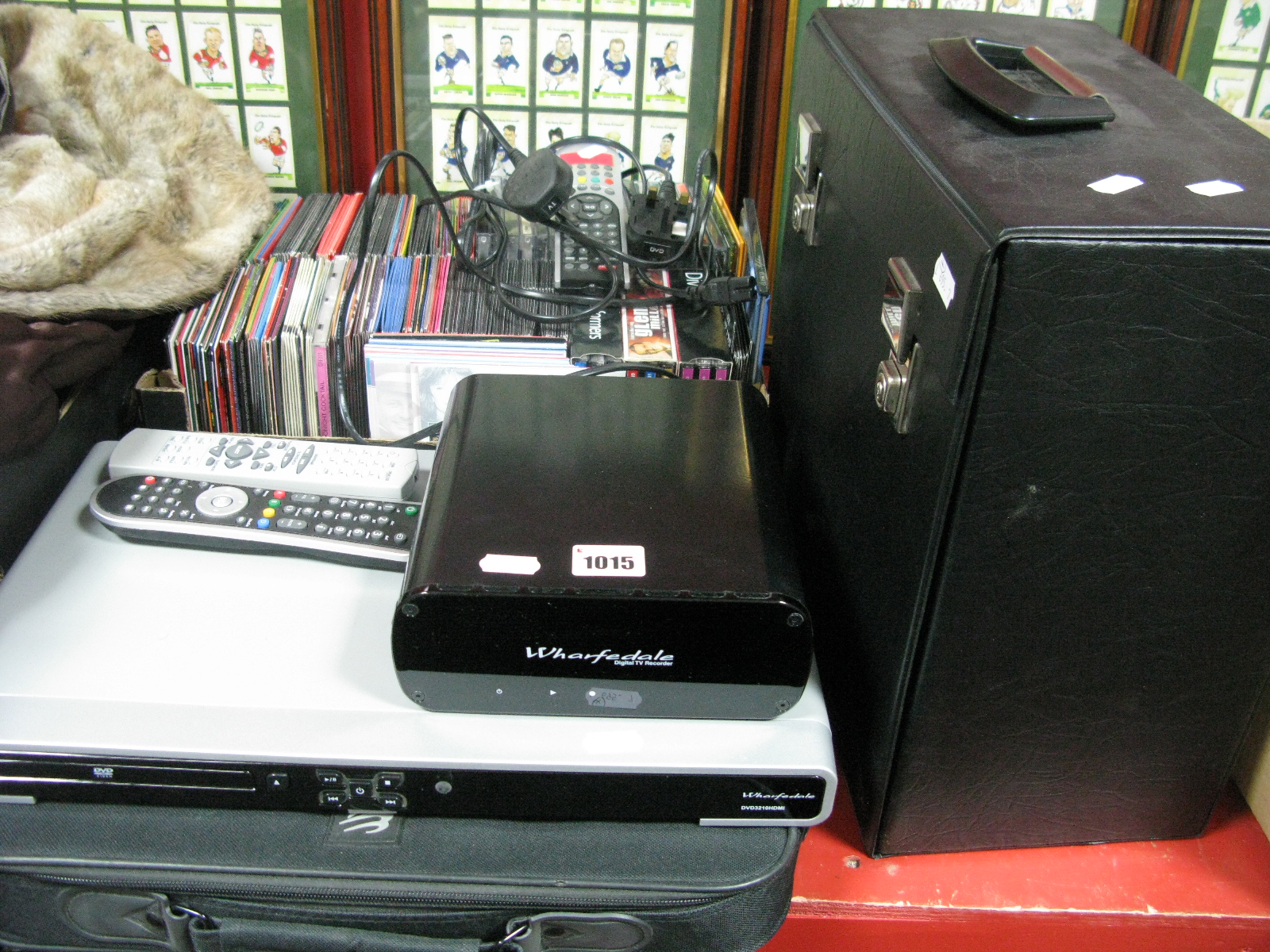 A Wharfdale Wdtr160 Digital TV Recorder, Wharfdale 3210 DVD player, DVD's, CD's, LP's in a case,