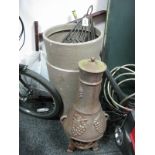 A Cast Iron Chimenea, iron chimney pot cowl, and two tapering cylindrical planters. (4)