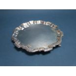 A Hallmarked Silver Salver, EV, Sheffield 1967, of plain circular shaped design, raised on three