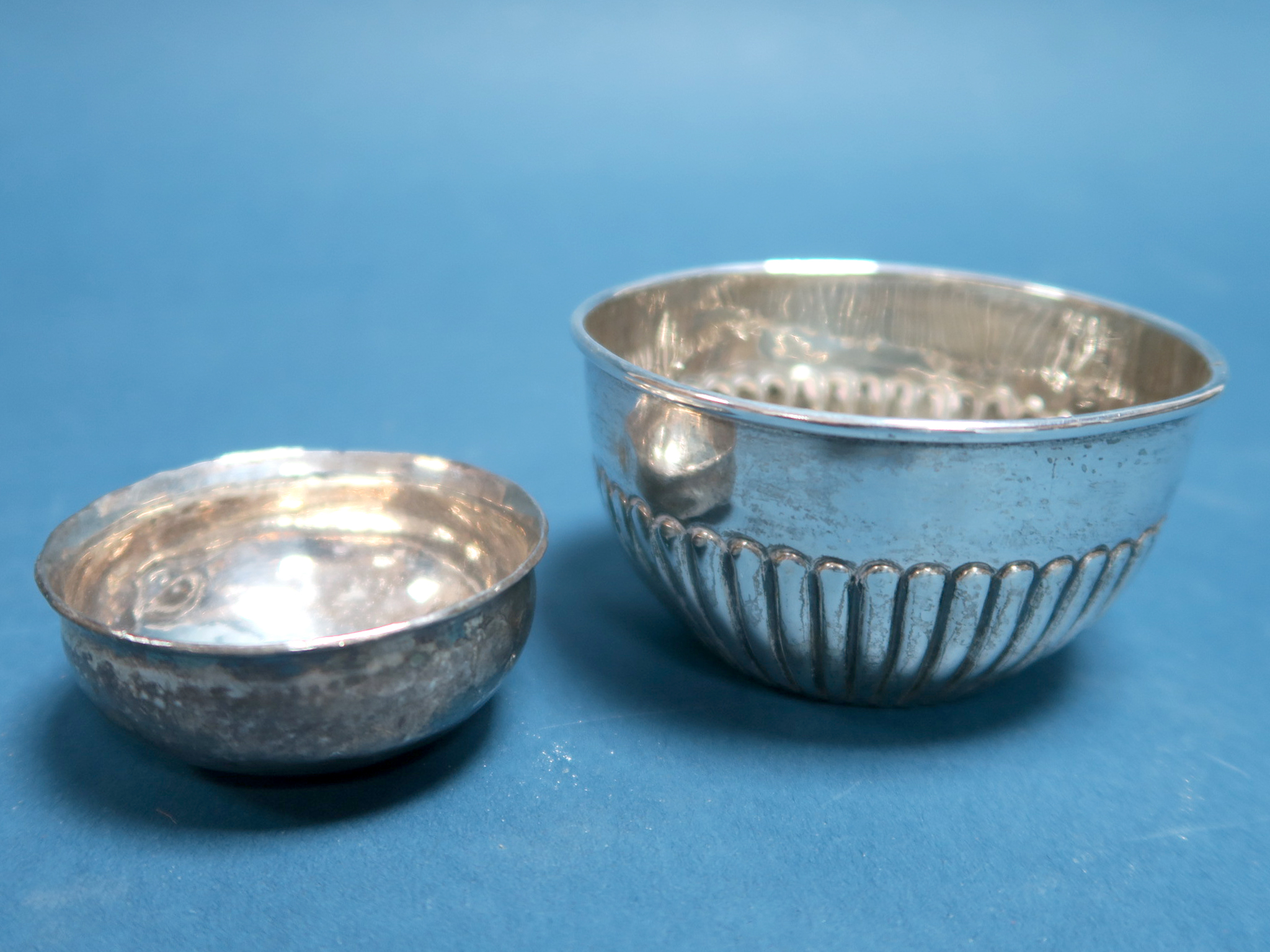 A Hallmarked Silver Bowl, (makers mark rubbed) Birmingham 1907, of circular semi reeded form, 8.