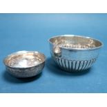 A Hallmarked Silver Bowl, (makers mark rubbed) Birmingham 1907, of circular semi reeded form, 8.