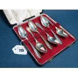 A Set of Six Hallmarked Silver Grapefruit Spoons, EV, Sheffield 1964, in a fitted case.