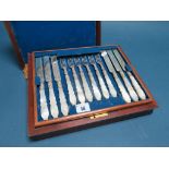 A Decorative Set of Eighteen Mother of Pearl Handled Dessert Knives and Forks, in original fitted