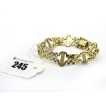 A Modern Bracelet, of geometric openwork design, to snap clasp, indistinctly stamped "585".