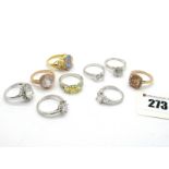 A Collection of Assorted Modern Dress Rings, claw set throughout, stamped "925".