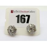 A Pair of Modern 18ct White Gold Diamond Cluster Earstuds, each of flowerhead design, claw set