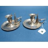 A Matched Pair of Hallmarked Silver Chambersticks, J.A, London 1818, 1819, each of plain design,