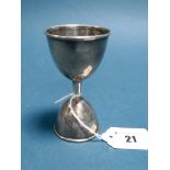 A Hallmarked Silver Measure, L&S, Birmingham 1904, of double egg cup form, 10cm high.