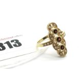 A 9ct Gold Edwardian Style Garnet and Pearl Set Ring, of elongated design, circular collet set (