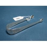 A Pair of Hallmarked Silver Sugar Tongs, GW, London 1831, with bright cut engraved decoration,