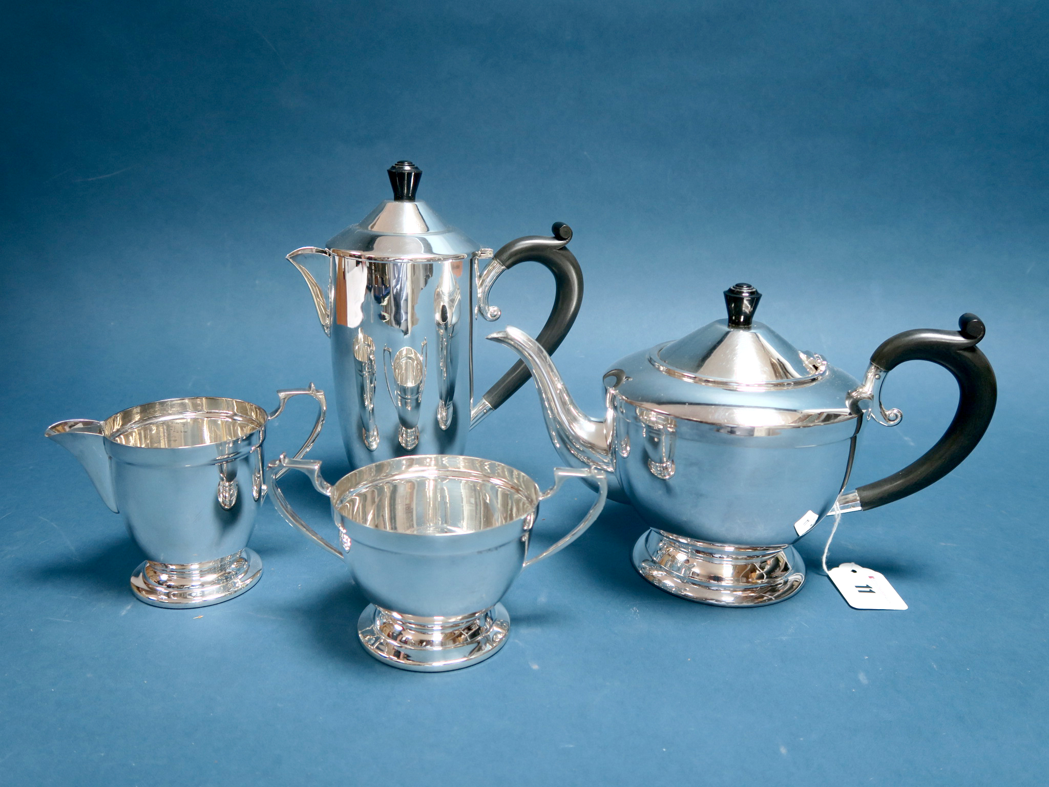 An Art Deco Style CSG&CO Electroplated Four Piece Teaset, each of plain tapering cylindrical