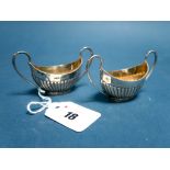 A Pair of Hallmarked Silver Salts, James Dixon & Son, Sheffield 1891, each of semi reeded boat