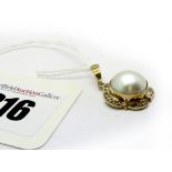 A Modern 9ct Gold Pearl and Diamond Set Pendant, circular collet set.