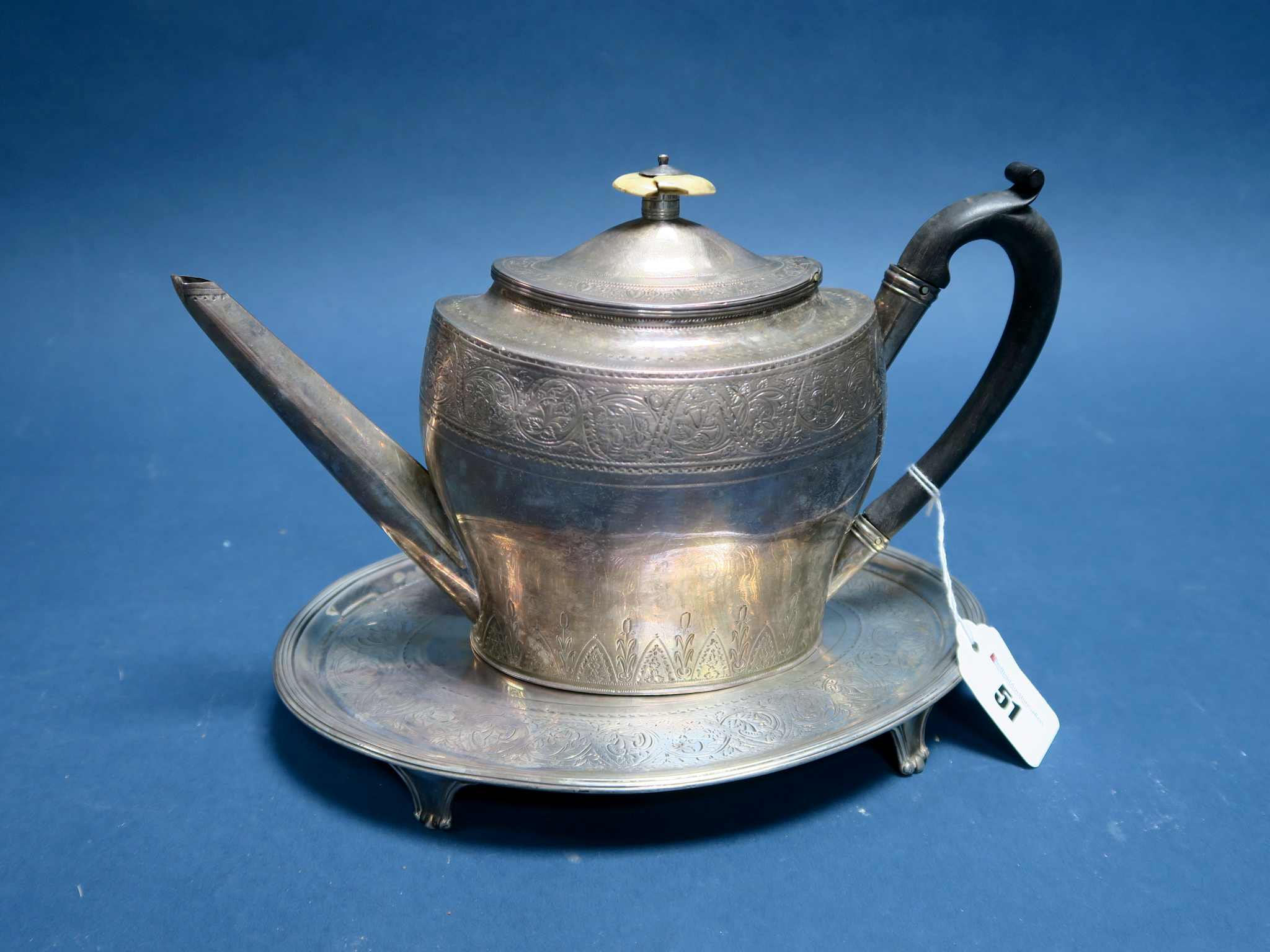 A Georgian Hallmarked Silver Teapot, HG, London 1796, of tapering oval form detailed with bands of