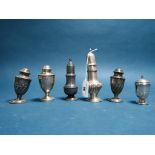 A Collection of Six Assorted Hallmarked Silver Pepperettes, (damages) tallest 14cm high.