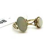 A Modern 9ct Gold Opal Set Ring, elongated oval cabochon collet set to the centre (closed back),