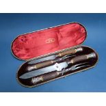 A Hallmarked Silver Mounted Joseph Rodgers & Sons Four Piece Carving Set, Sheffield 1886, in
