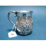 A Hallmarked Silver Mug, (makes mark rubbed) Birmingham 1894, of baluster form allover detailed in