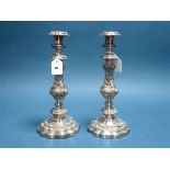 A Highly Decorative Pair of Plated Candlesticks, each shaped circular base supporting square
