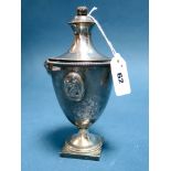 A Hallmarked Silver Urn and Cover, JES, Sheffield 1893, with twin rams masks and oval cameo style