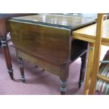 An XVIII Century Mahogany Washstand, with drop leaves, hinged top with drawer and cupboard to