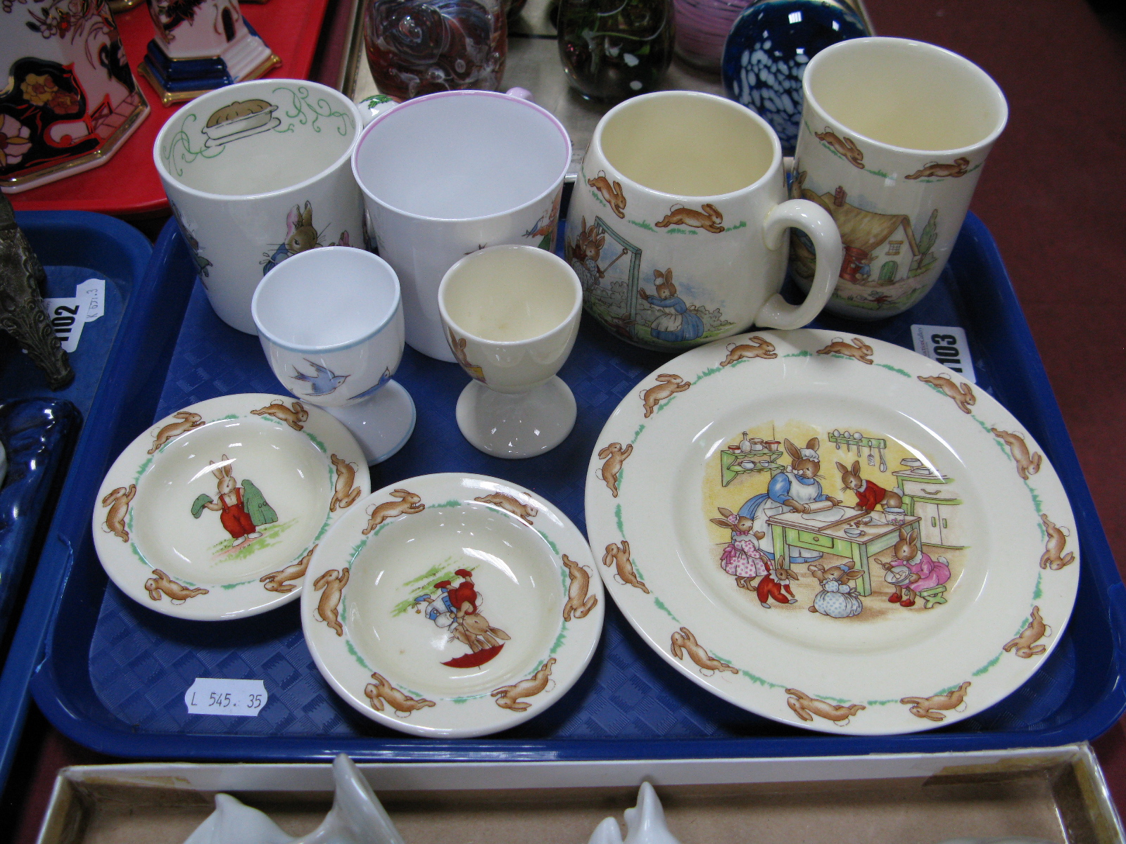 A Shelley Mabel Lucie Attwell Mug, egg cup, Wedgwood Peter Rabbit mug, Doulton Bunnykins ware etc: