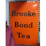 An Orange Enamel Single Sided Advertising Sign' Brooke Bond Tea', with a black and white chequered